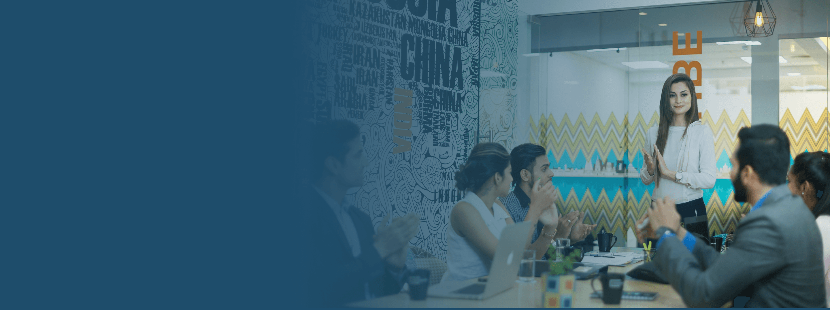 Corporate team collaborating in a modern office