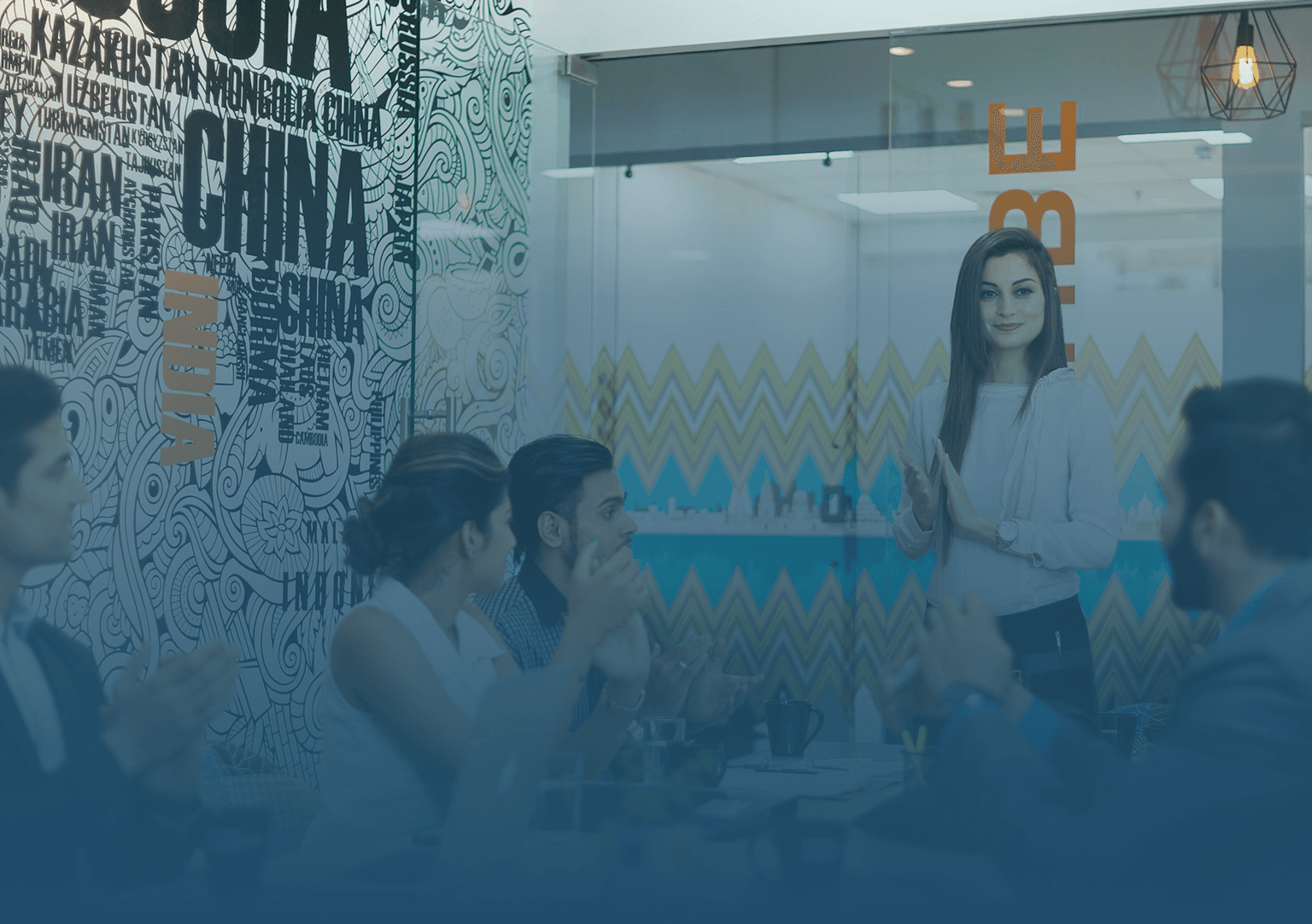 Corporate team collaborating in a modern office